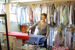 photo of wirral ironing services staff ironing.